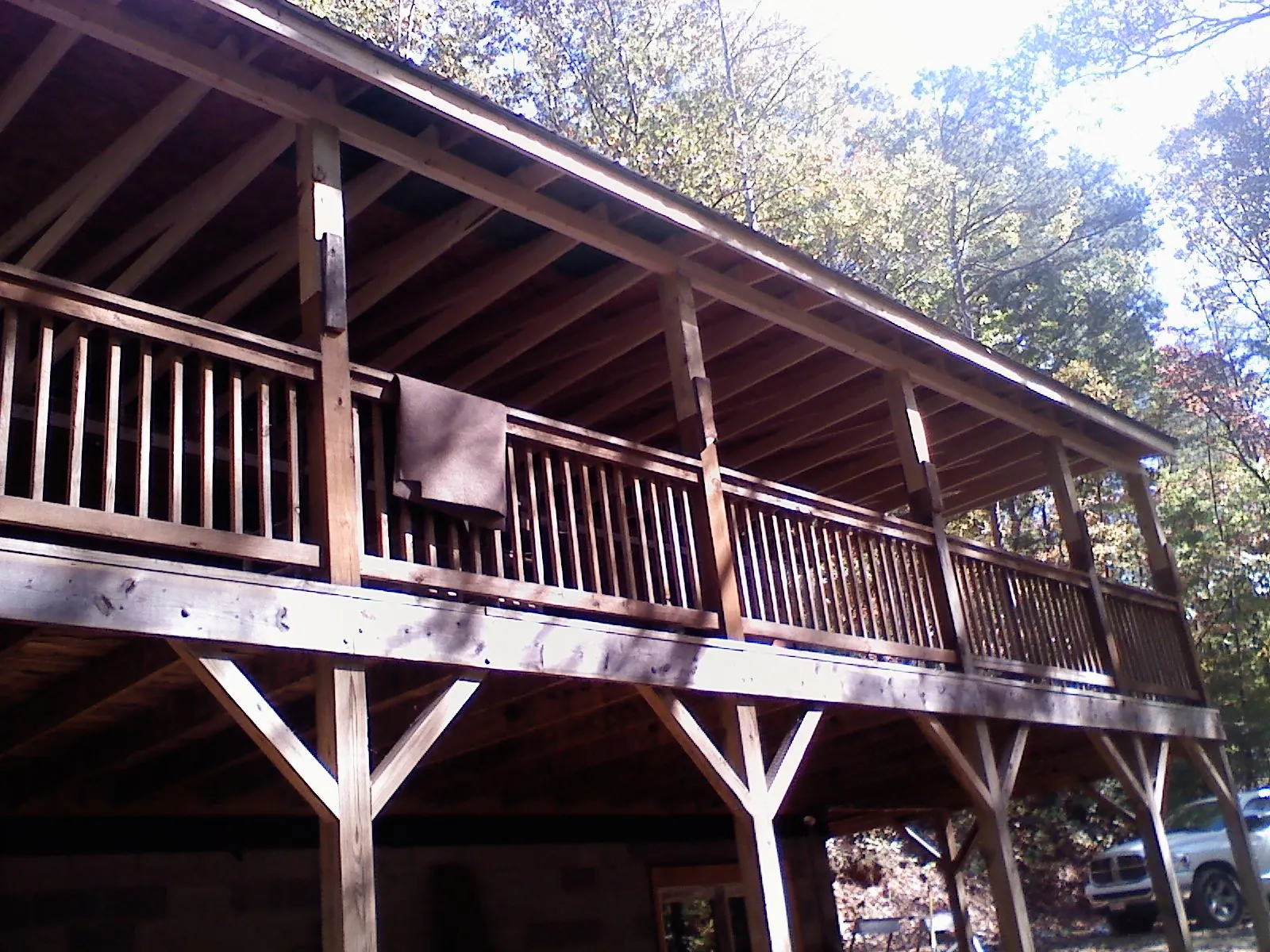 Timber framing under a new elevated porch and deck — Roof Leak Repair in Fountain City by Roofing Brothers